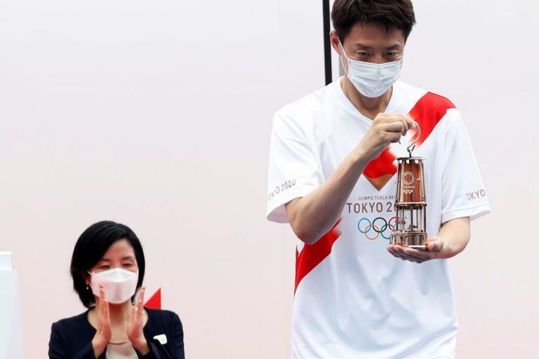 La flamme olympique est arrivée à Tokyo sans public, le 9 juillet 2021. © Kim Kyung-hoon, AFP